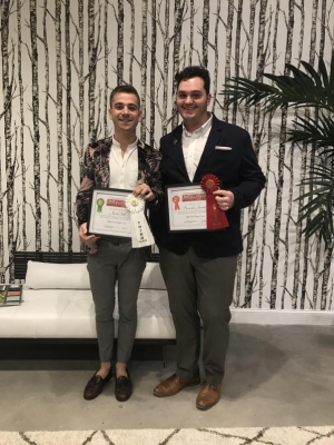 Interior design sophomores Jacob Still (left) and Brandon Jarrett pose with their High Point Design Competition awards. Photo submitted by Jacob Still